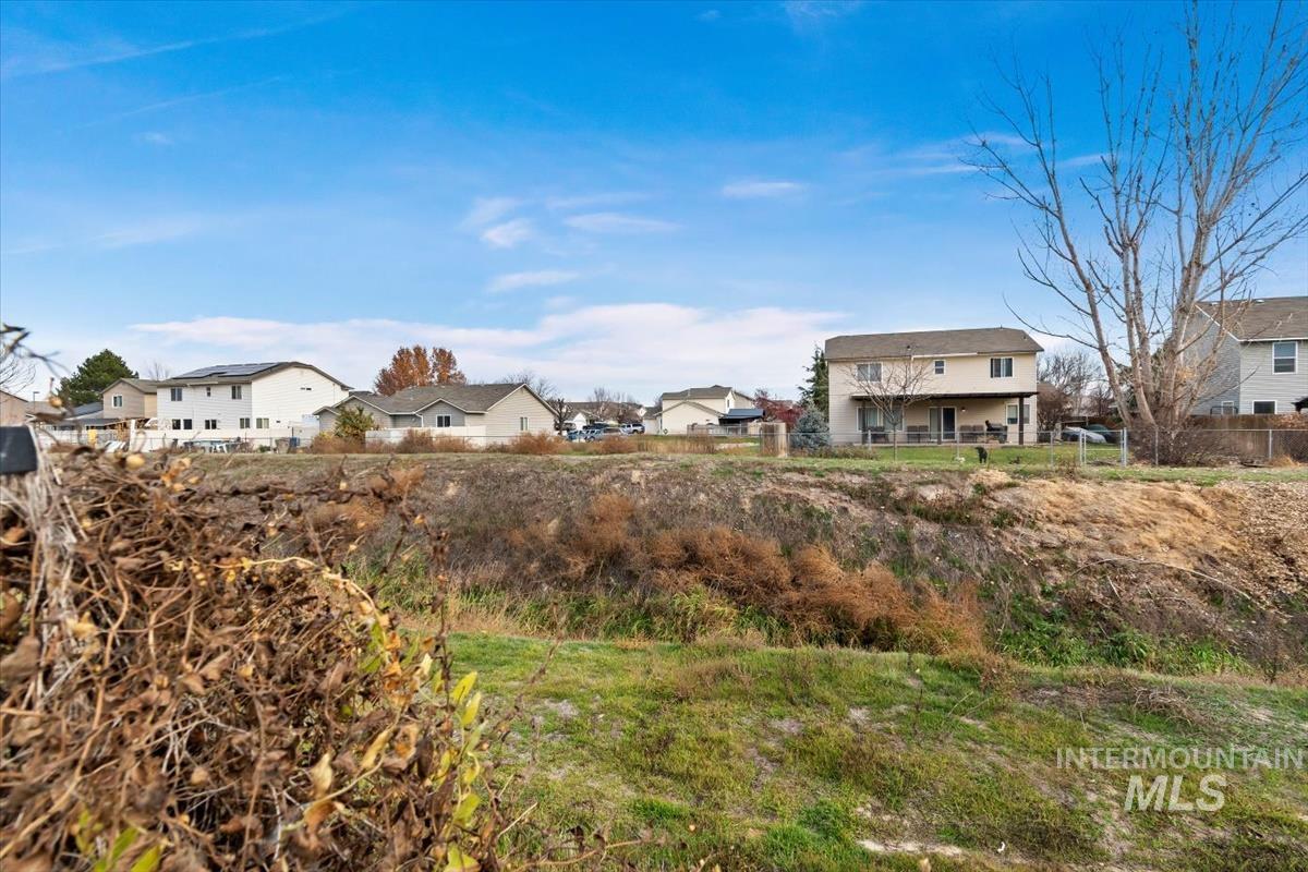 View of yard with a residential view