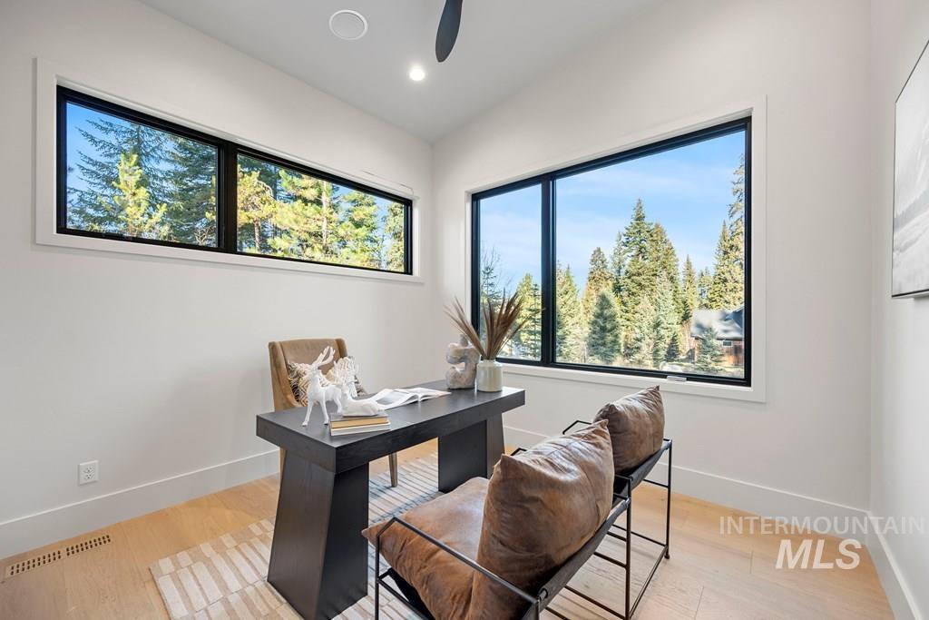 Office space featuring light wood-type flooring, recessed lighting, and ceiling fan - Could also be a bedroom - Main Floor