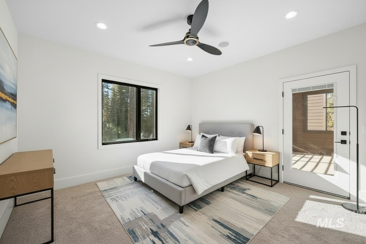 Bedroom featuring light carpet, ceiling fan, and recessed lighting