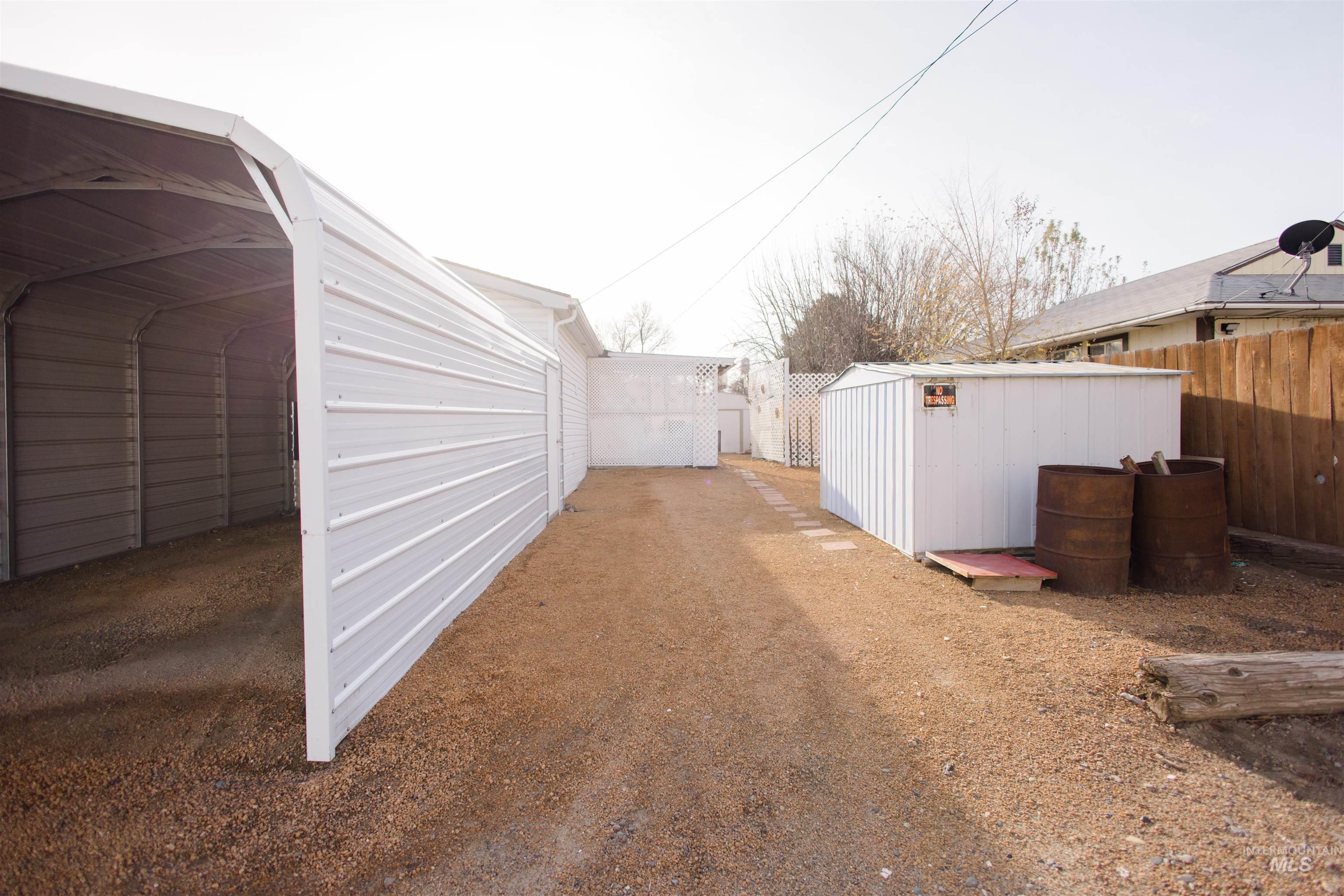 View of yard with a shed