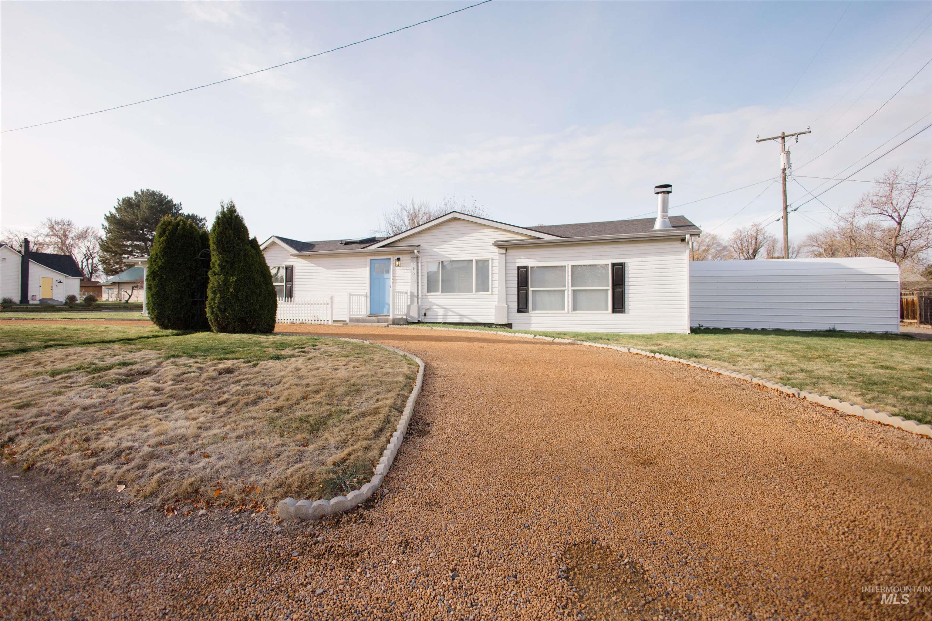 Ranch-style home with a front yard