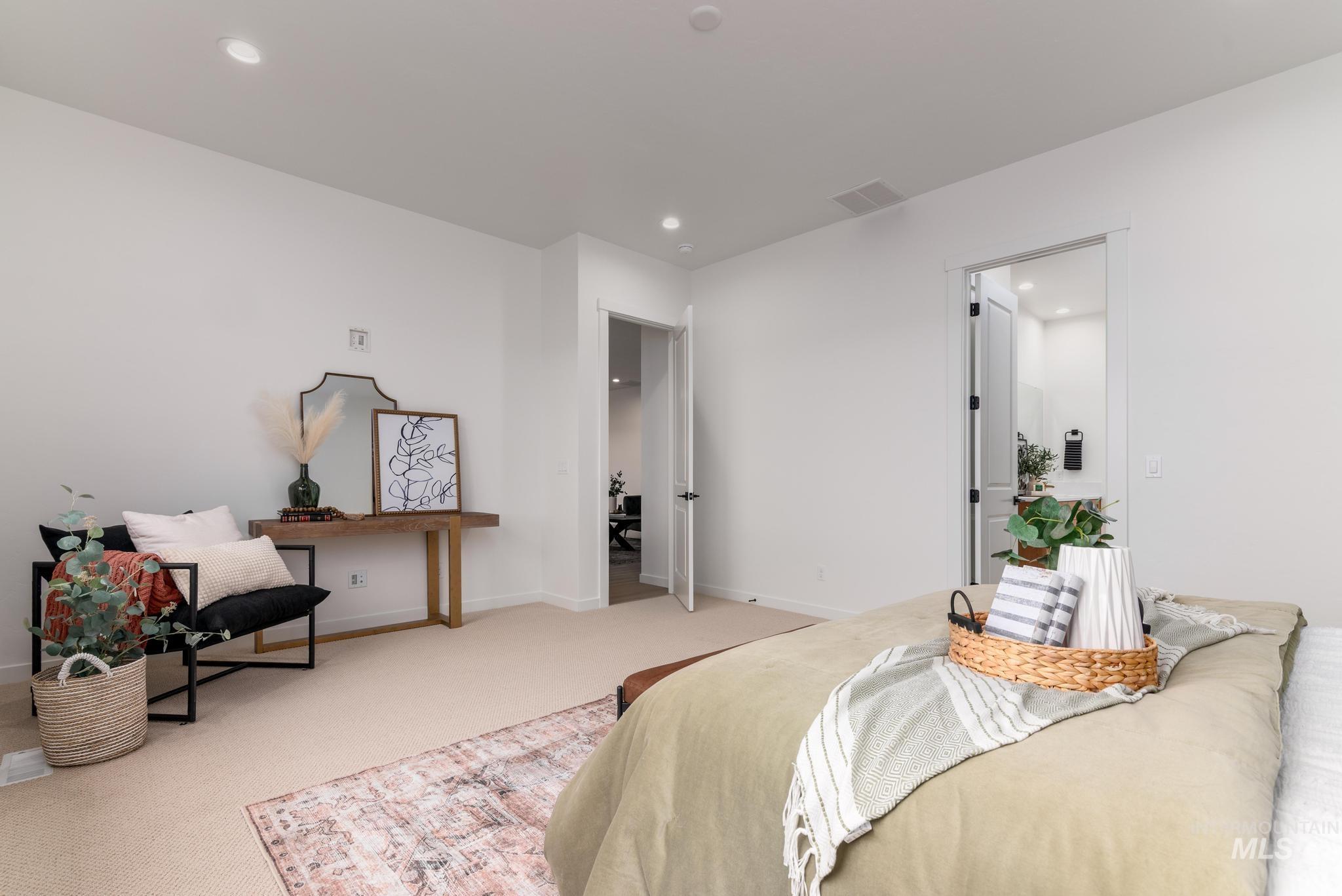 Bedroom featuring carpet and recessed lighting