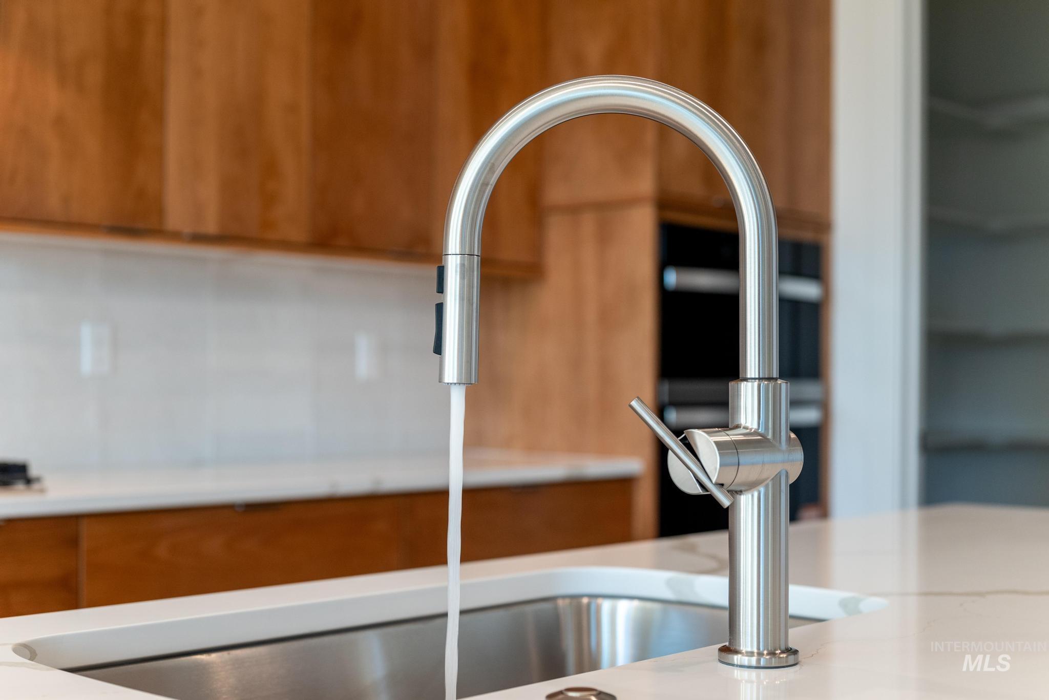 Kitchen view of brown cabinets