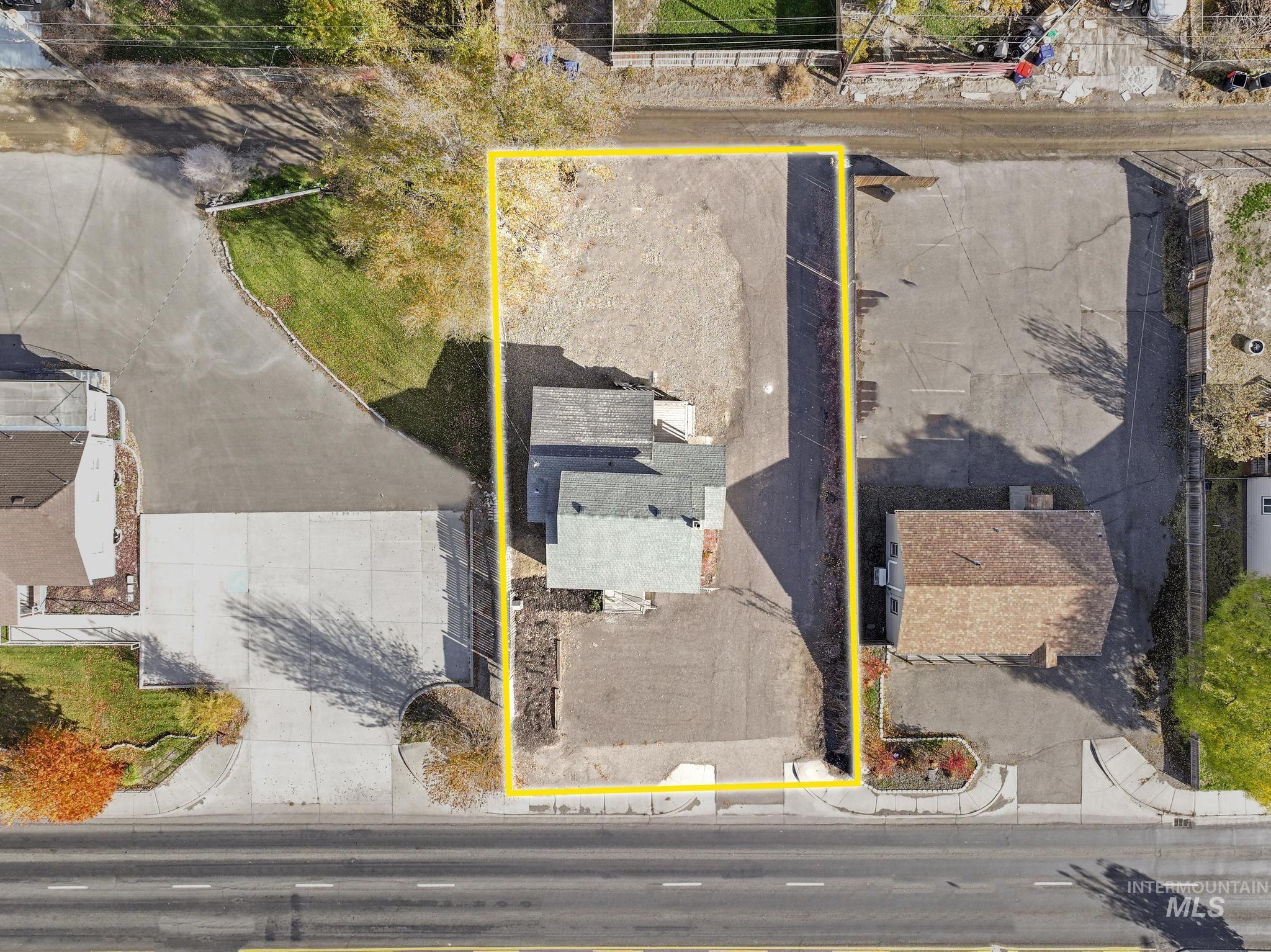 Aerial overview of property's location with property parcel outlined