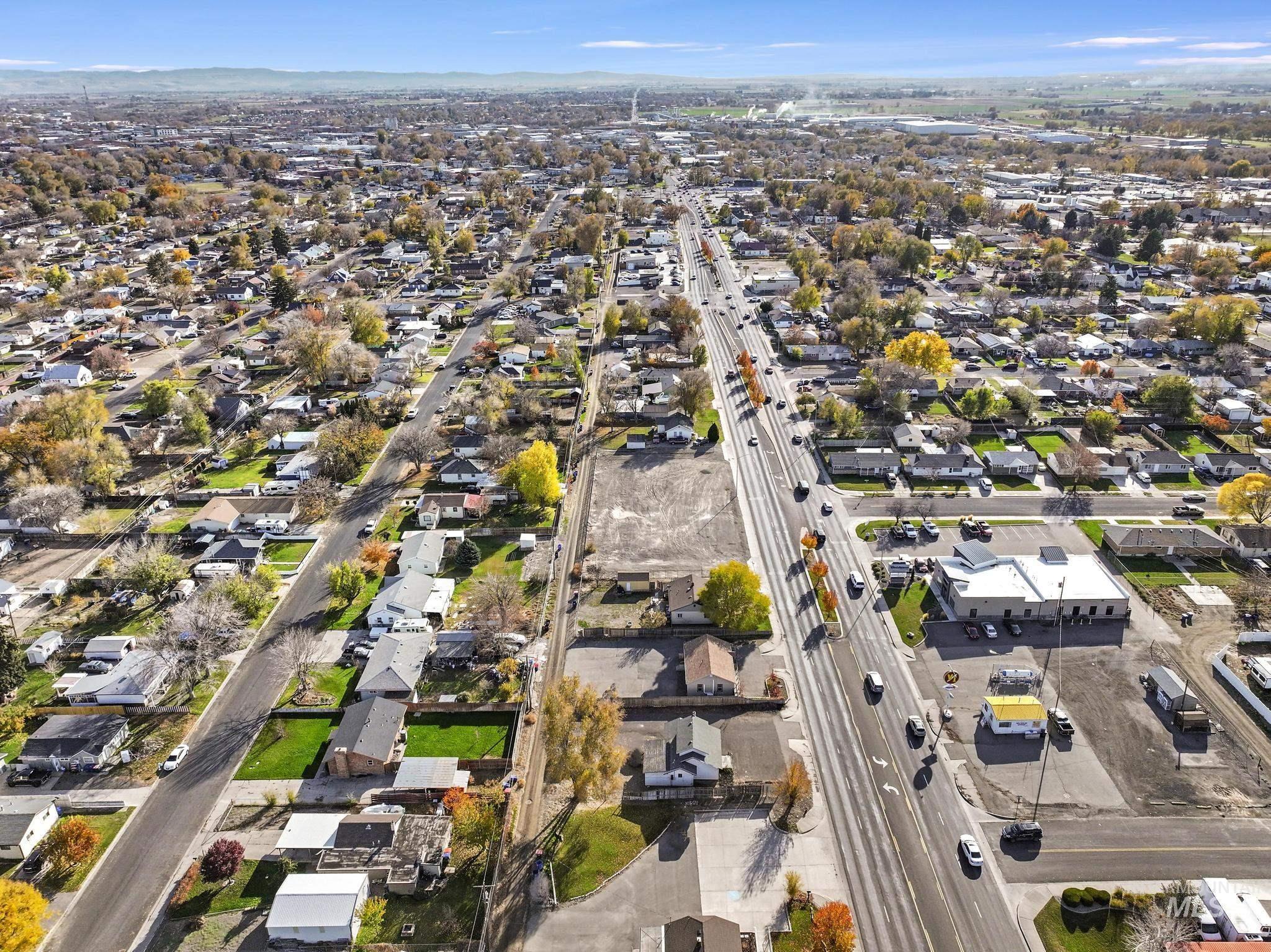 View of property location with nearby suburban area