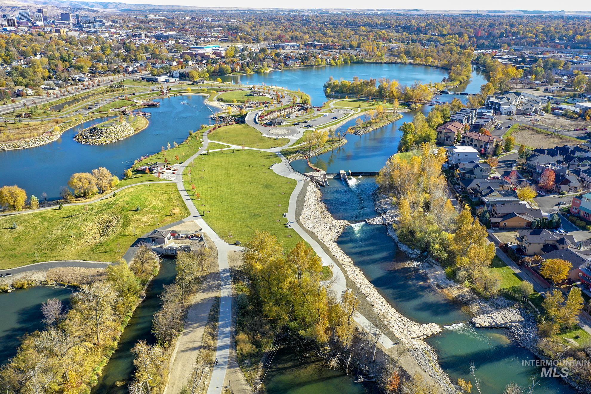 Aerial view of property's location featuring a nearby body of water