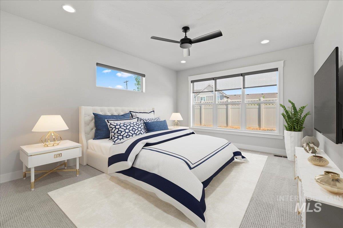 Bedroom with carpet flooring, recessed lighting, and a ceiling fan