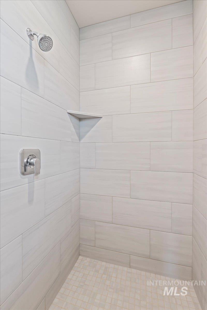 Bathroom with a tile shower