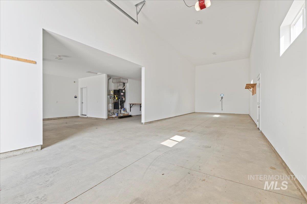 Garage featuring heating unit