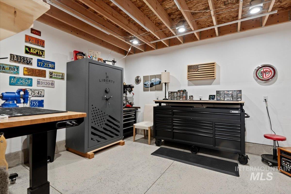 Misc room featuring speckled floor