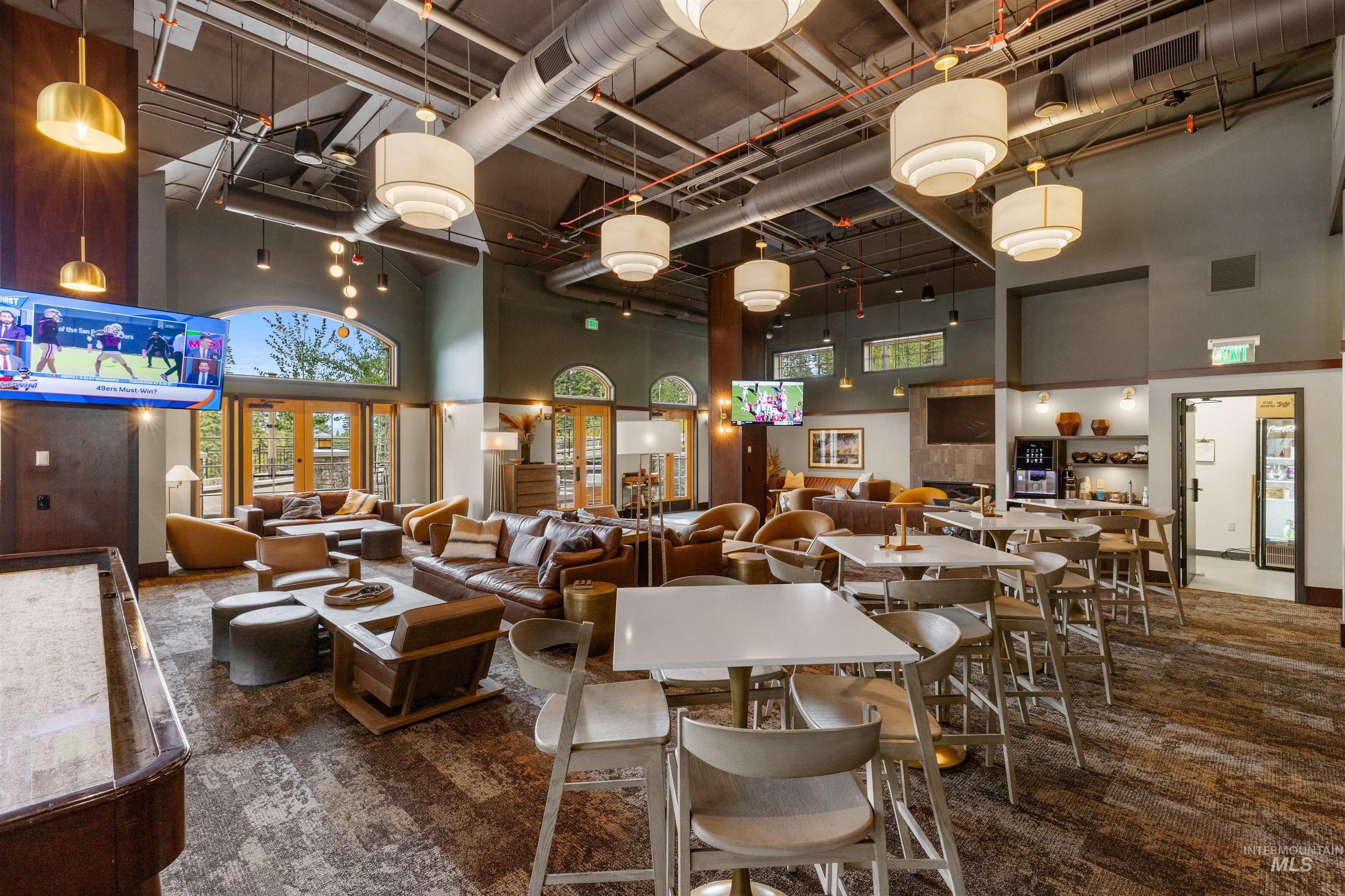 Common area with a towering ceiling