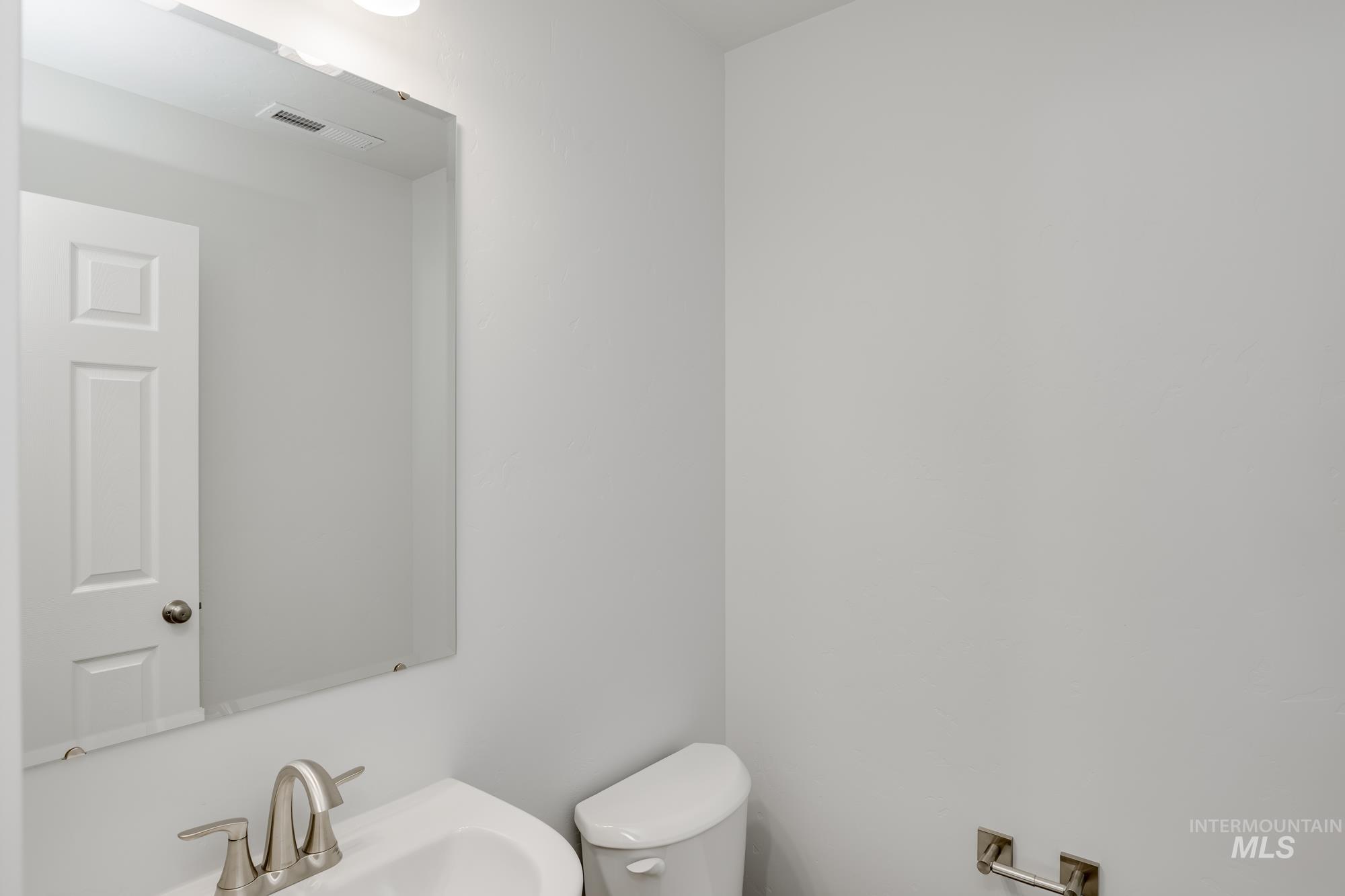 Bathroom with toilet and a sink