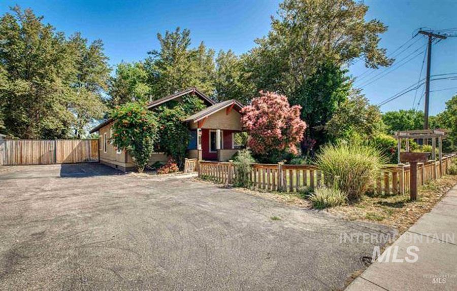 View of front of property with a fenced front yard