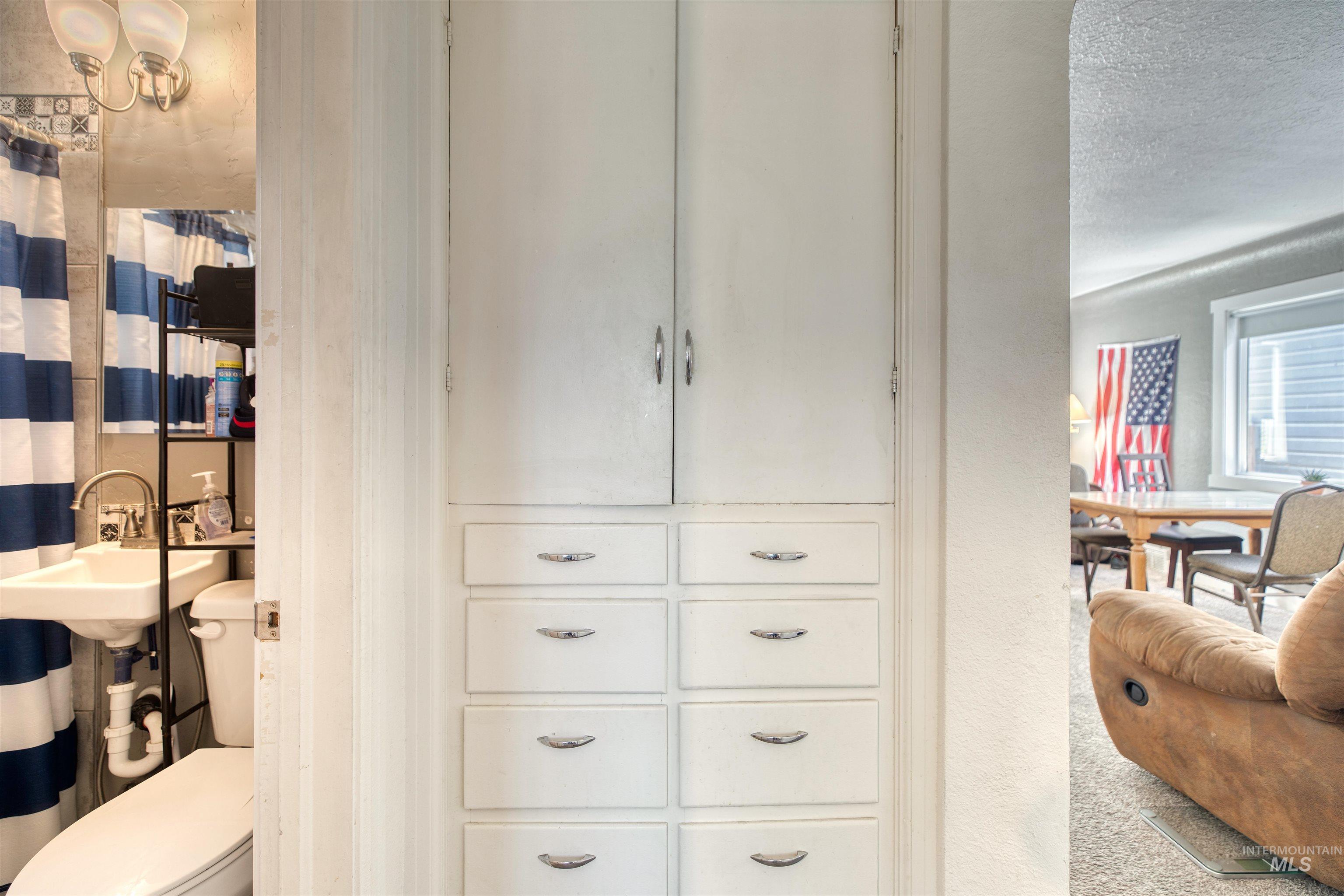 Detailed view of a textured ceiling and a sink