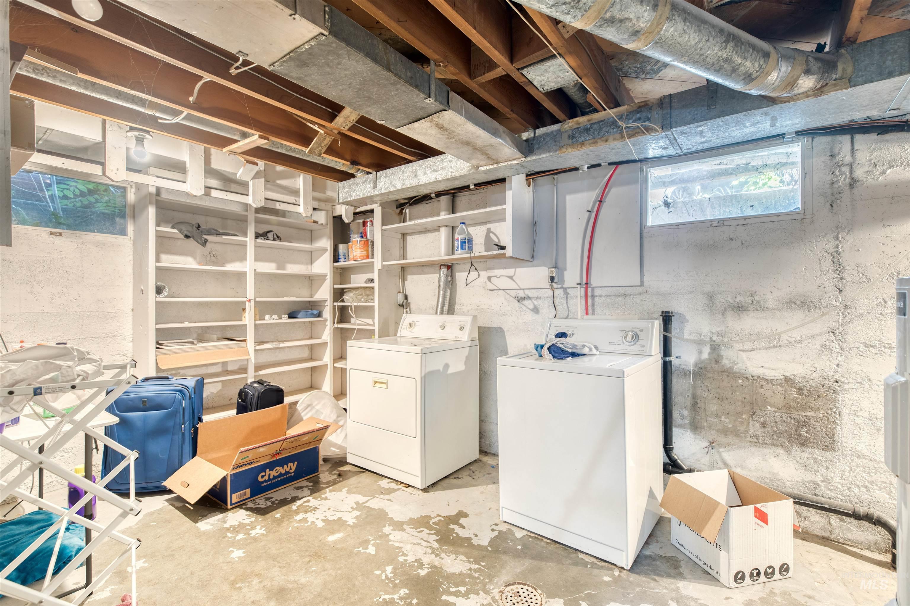 Basement with plenty of natural light and separate washer and dryer