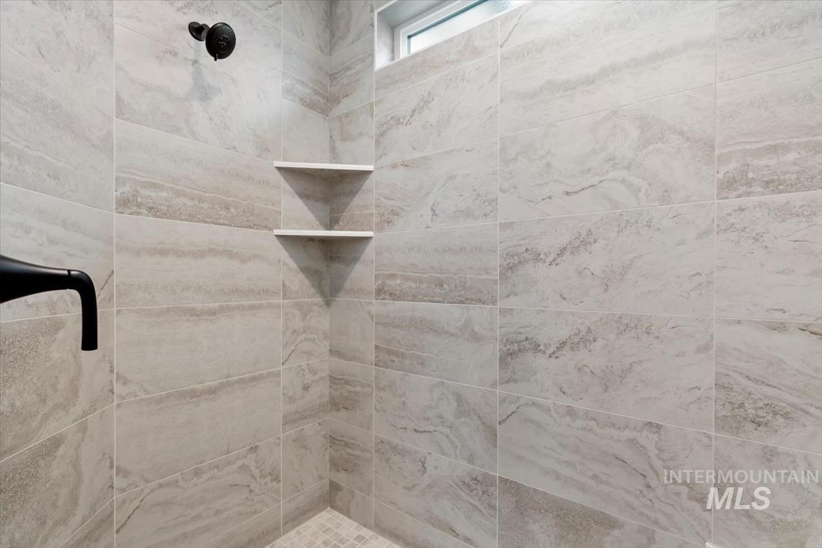 Bathroom with a tile shower