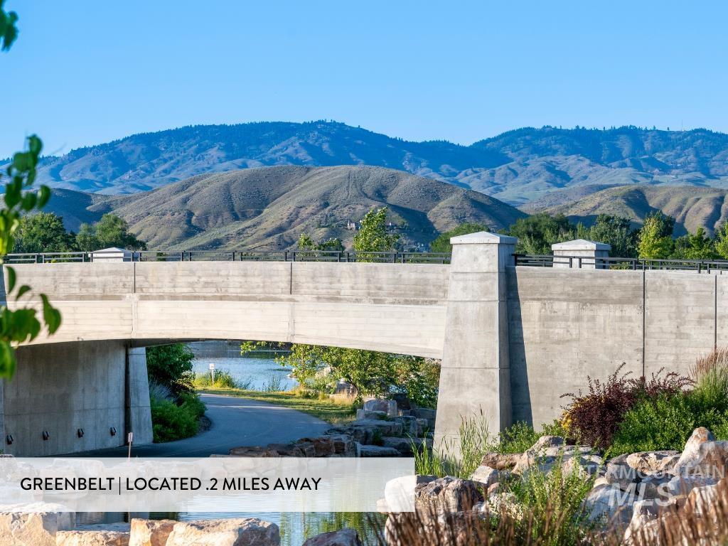 View of mountain background featuring a notable bridge