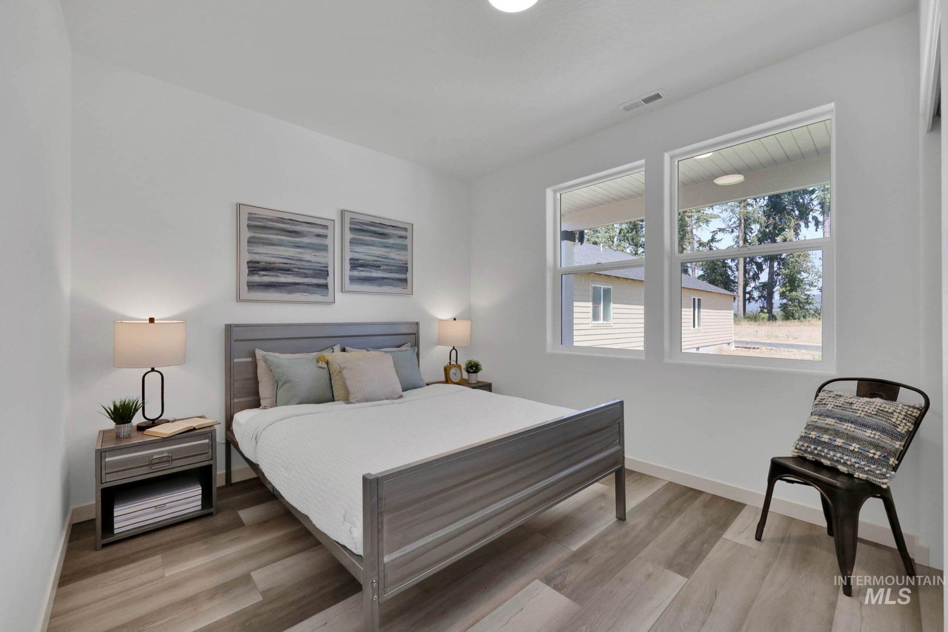Bedroom with light wood-type flooring