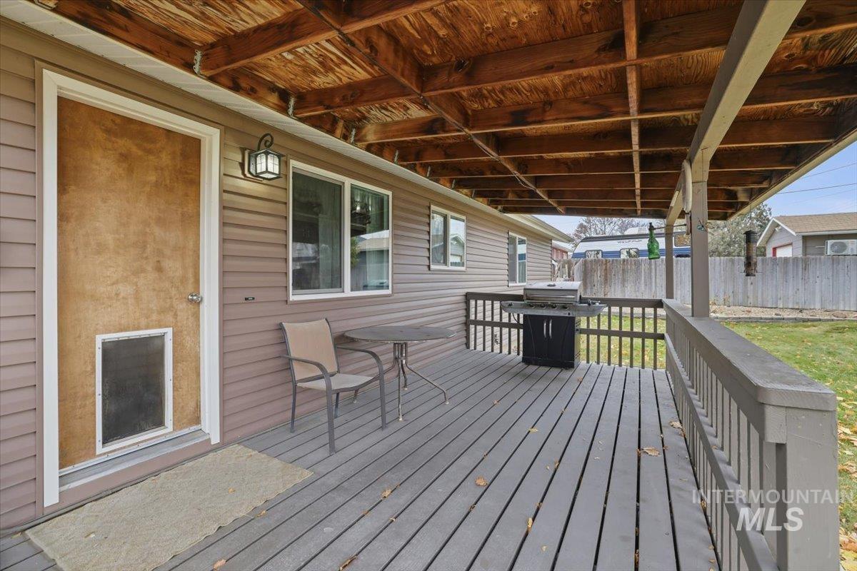 Deck featuring a grill