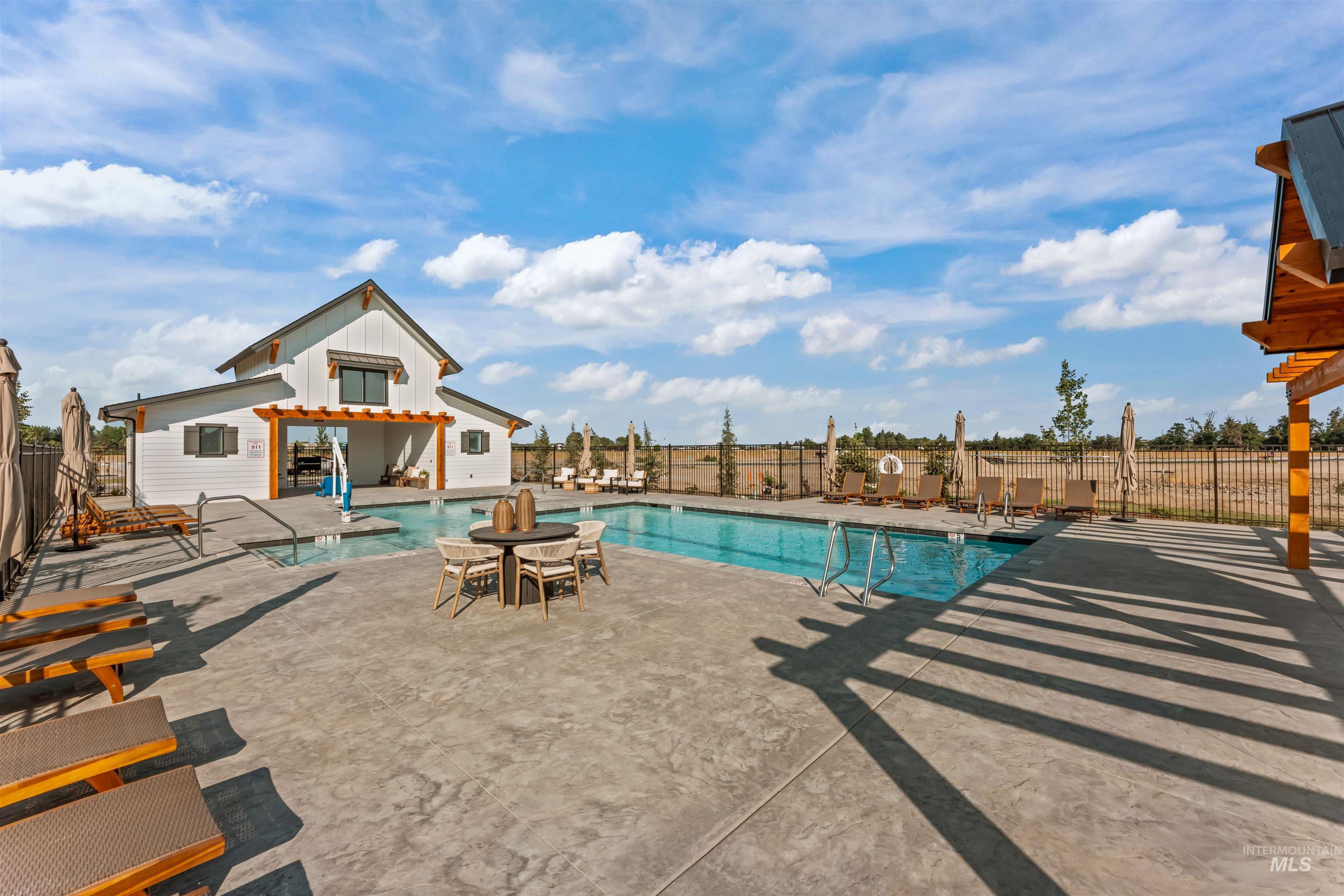 Community pool with a patio area