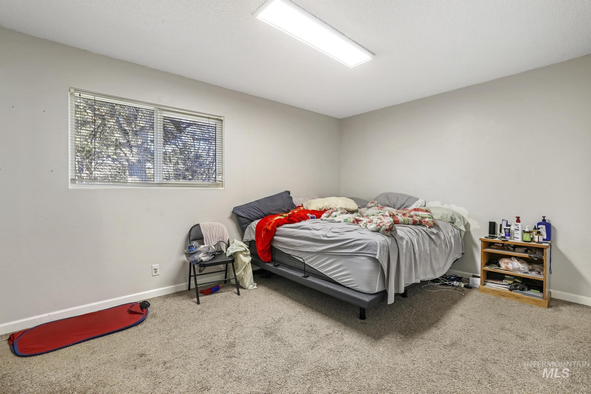 Bedroom featuring carpet flooring