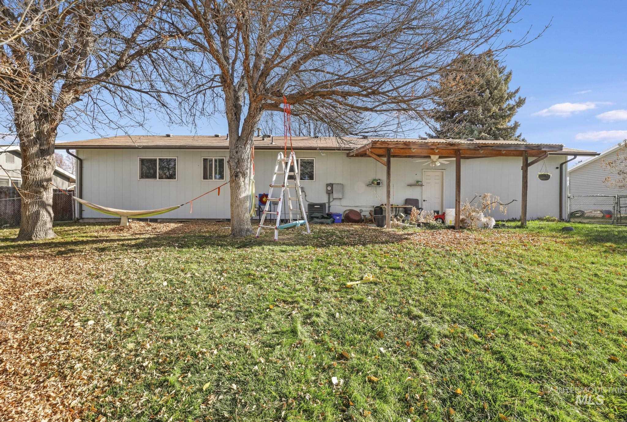Back of property featuring a patio