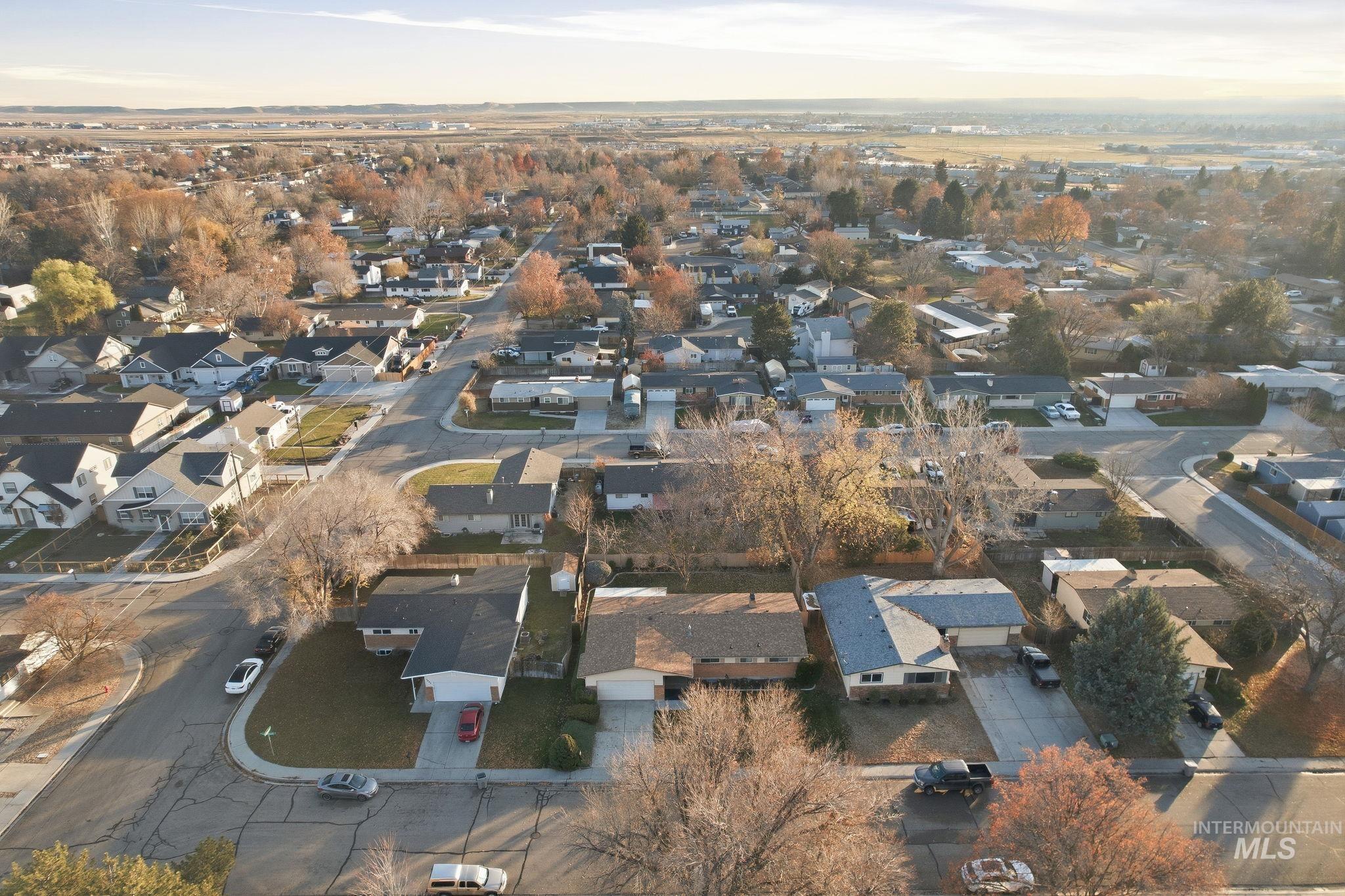 View of property location with nearby suburban area