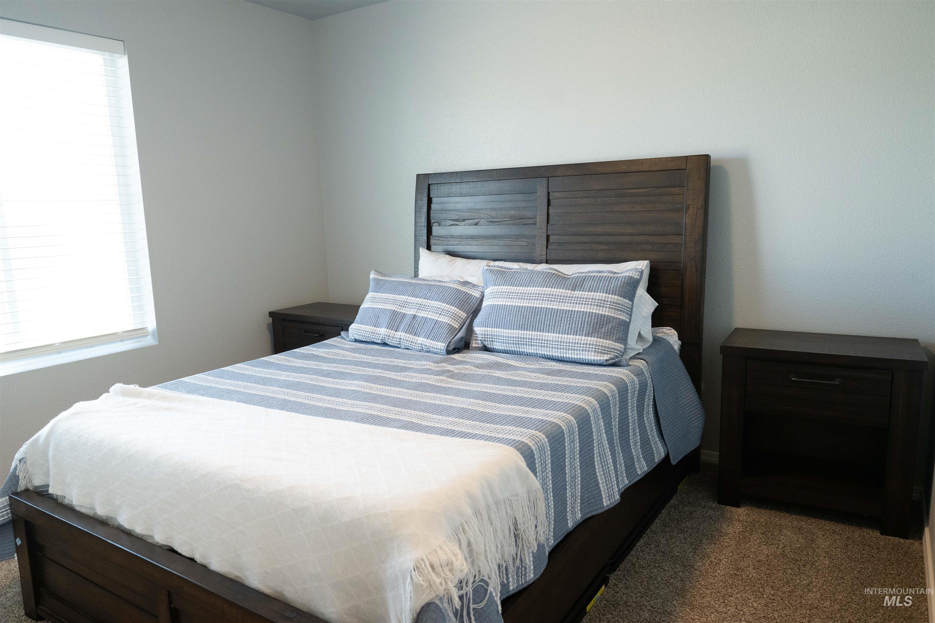 Bedroom with carpet flooring