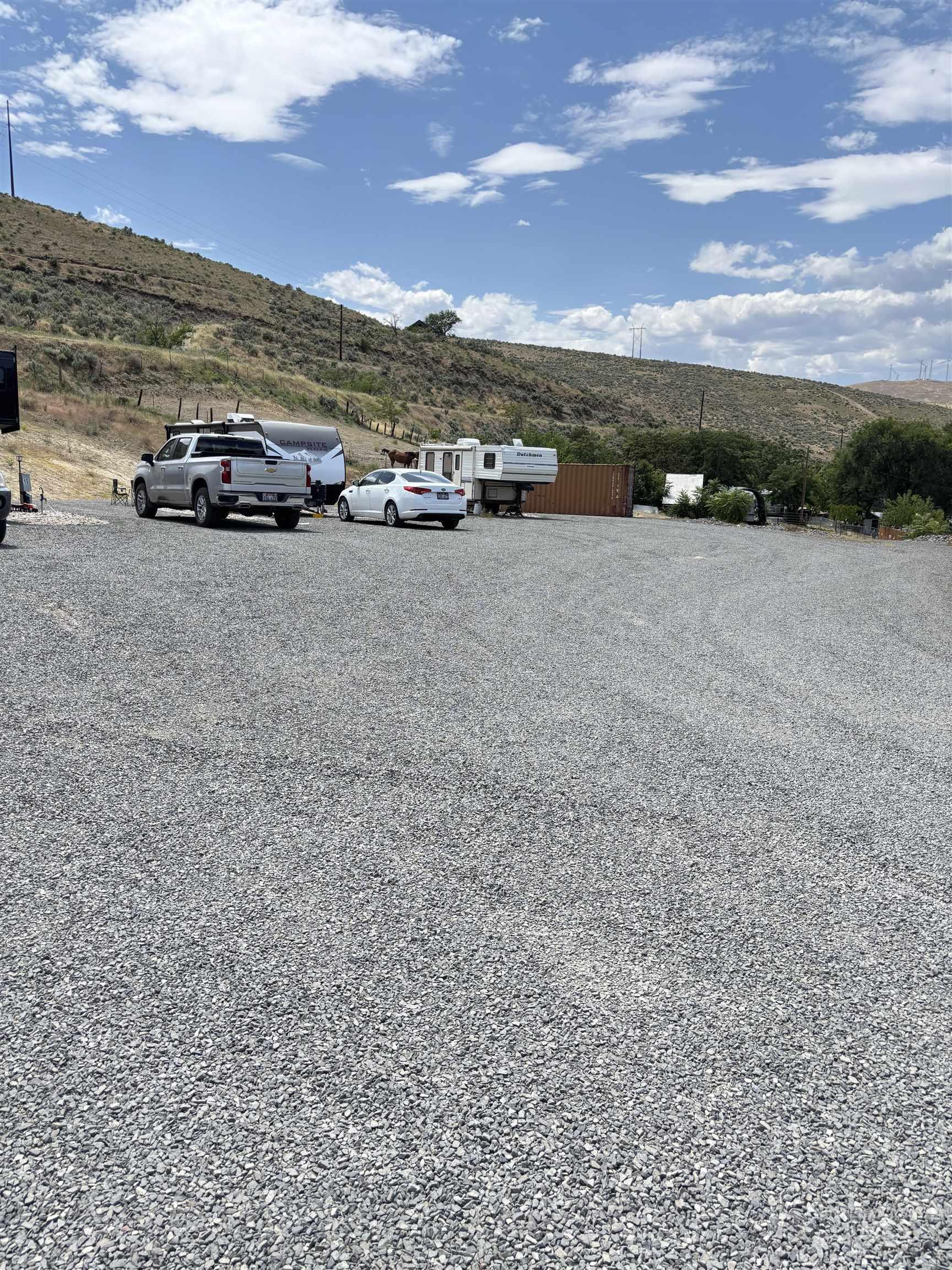 View of vehicle parking with a mountain view