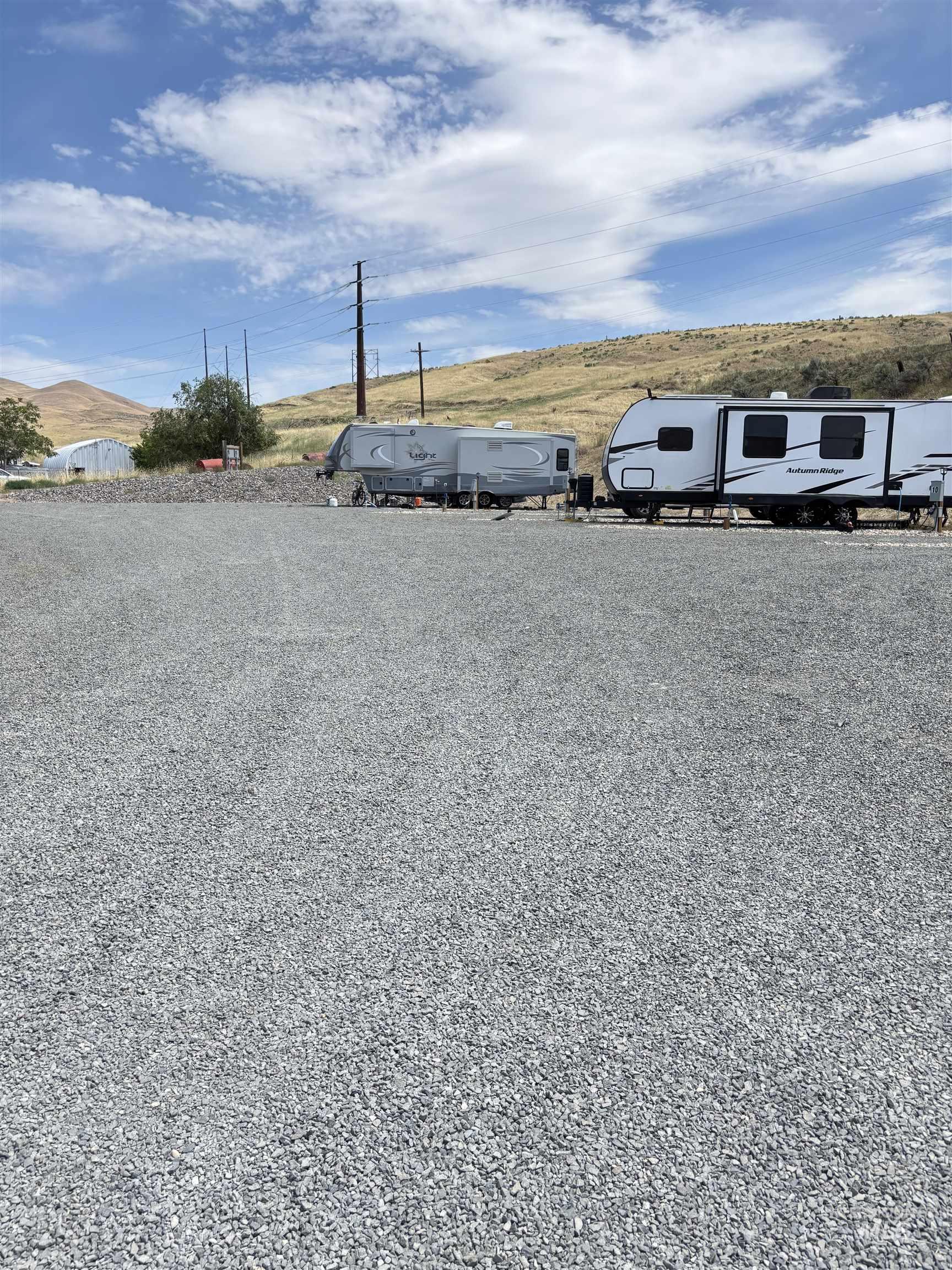View of parking / parking lot featuring a mountain view