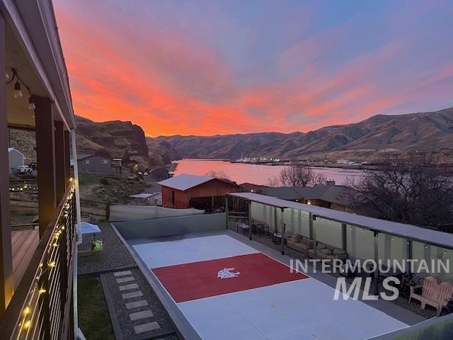 Mountain view featuring a large body of water