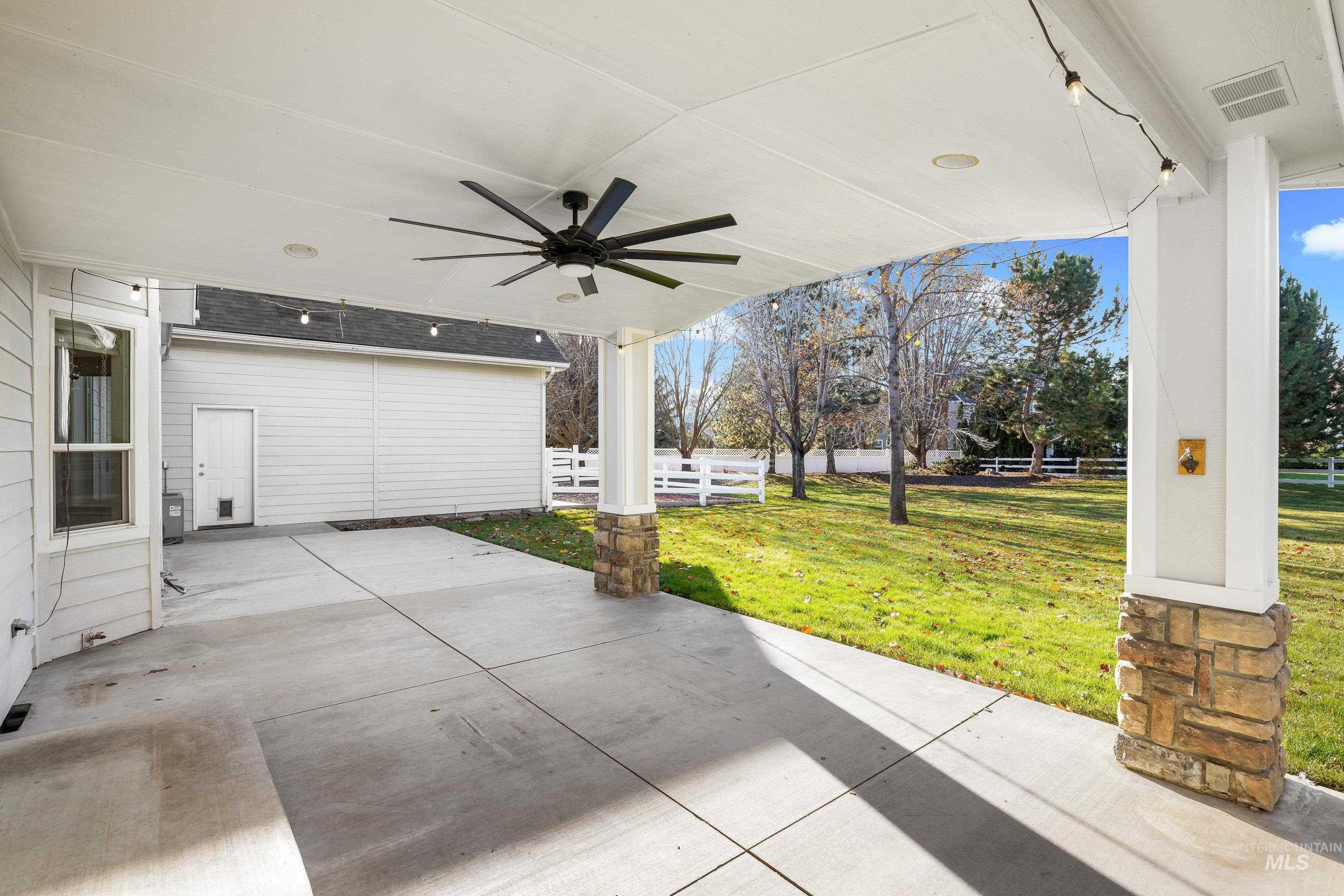 View of patio / terrace featuring a ceiling fan