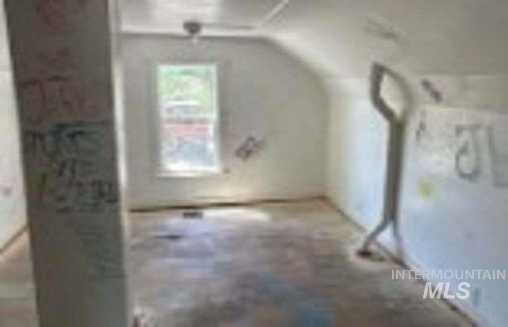 Bonus room featuring lofted ceiling