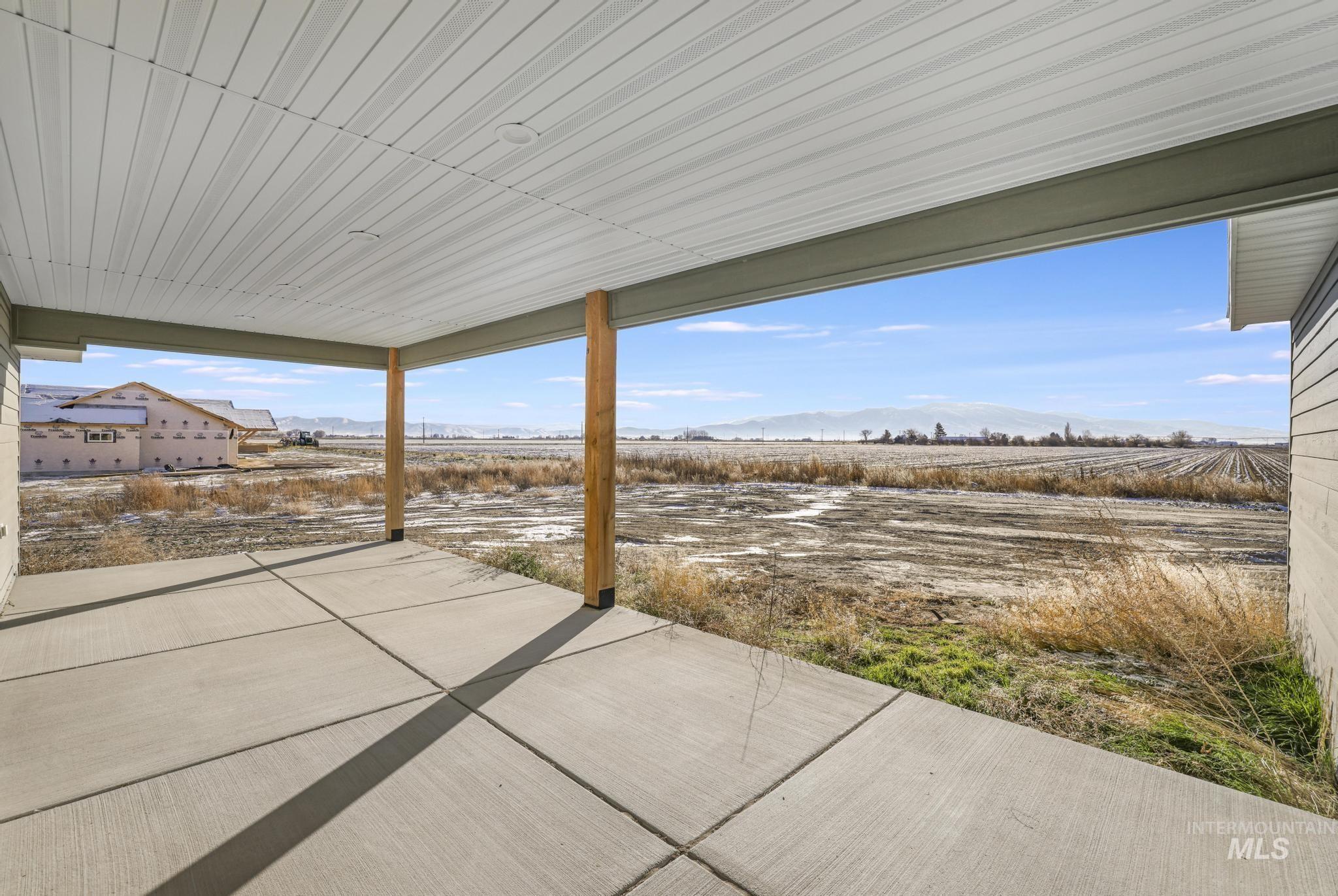 View of patio with a mountain view